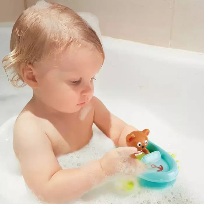 Игрушка для купания Мишка на тюбинге