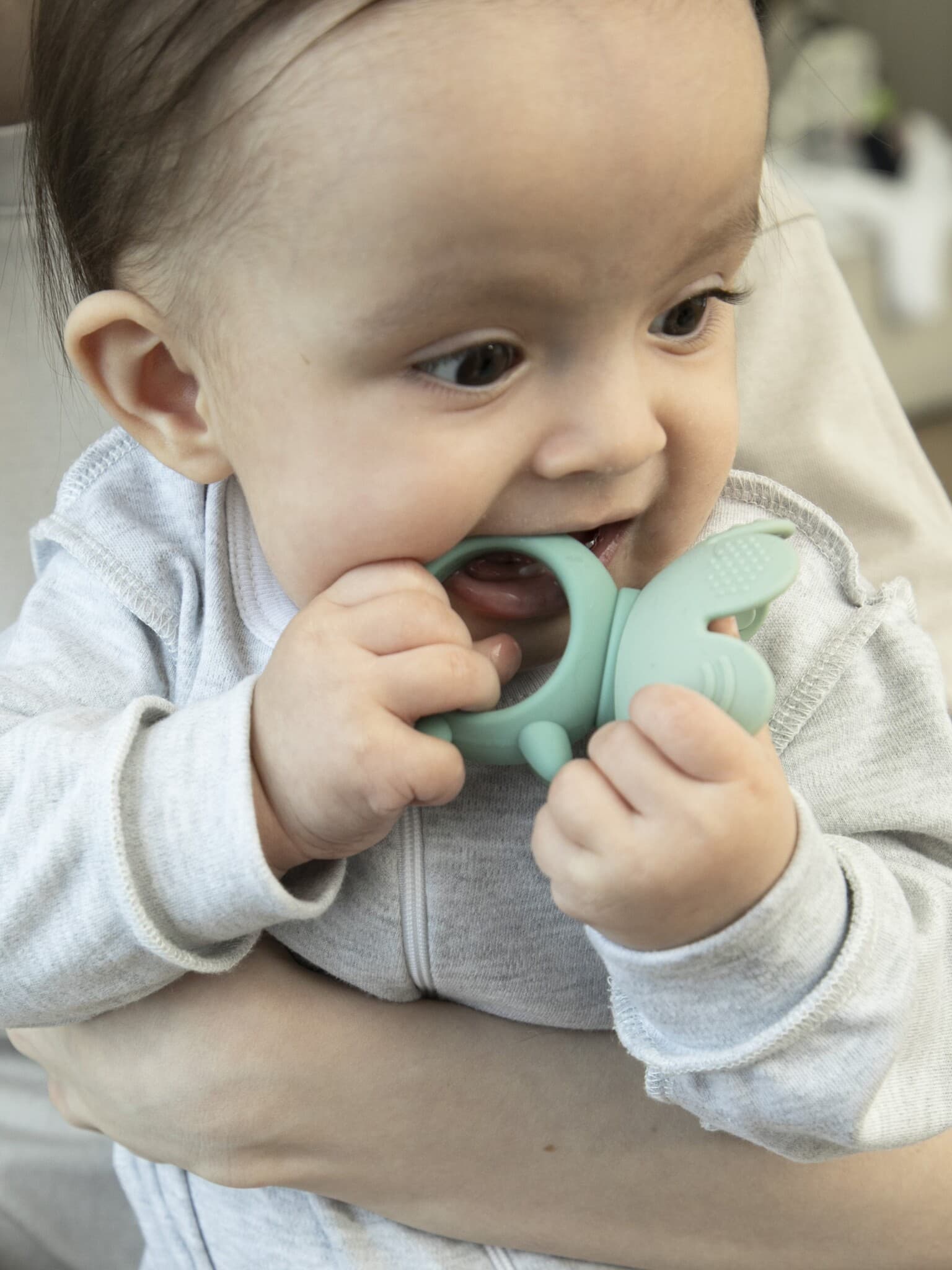 Игрушка-прорезыватель FLORAL LION, Pistachio